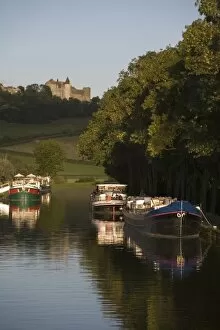 Barges tied to bank of Burgundy Canal, Chateau Neuf en Auxois, Cote d Or, Burgundy