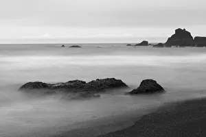 Pillar Prints: Basalt sea stacks in the ocean, Vik, Iceland
