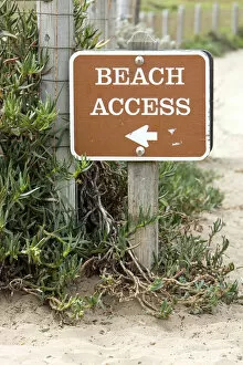 Beach Access sign points to public access to the beach