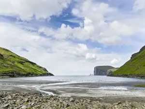 Images Dated 22nd June 2016: Beach at Tjornuvik. In the background the island Eysturoy with the iconic sea stacks Risin