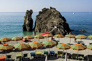 Images Dated 1st May 2021: Beach umbrellas lining the beach in Monterosso al Mare, Cinque Terre, Italy