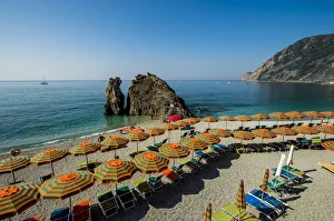 Images Dated 1st May 2021: Beach umbrellas lining the beach in Monterosso al Mare, Cinque Terre, Italy