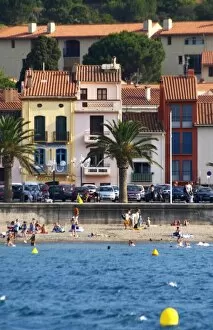 The beach in the village. Colourful houses along the water. Collioure. Roussillon