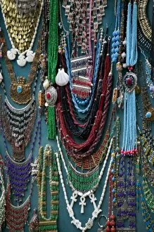 Images Dated 19th October 2005: Beads for sale by vendor in the Market Place Luxor, Egypt