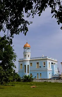 Cienfuegos Prints: Beautiful blue building hotel from private home along the Malacon in Cienfuegos Cuba