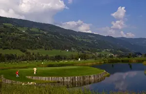 Golf Prints: Beautiful golf with golfers at the #18 hole at exclusive Golf Club Murau Kreischberg