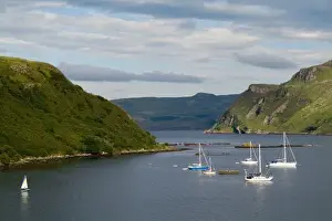 Images Dated 27th July 2020: Beautiful port and sailboats with reflections in small tourist village of Portree