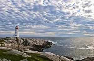 Images Dated 23rd June 2028: Beautiful sky and lighthouse in Peggys Cove in Nova Scotia Canada and rocks