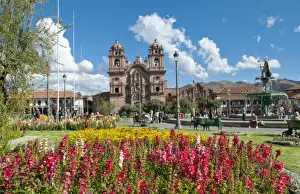 Images Dated 2028 November: Beautiful visual image of Main Square thru flowers in sunshine of Cusco Cuzco Peru and La Compania