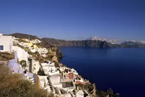 Slow Prints: The beautiful white buildings on the cliffs in Oia of santorini Greece