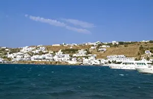 Hilly Prints: Beautiful white buildings in downtown village of the island of Mykonos Greece