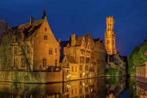 Belgium Prints: Belgium, Bruges. Buildings reflect in canal at twilight