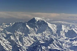 Images Dated 21st April 2006: BHUTAN. Eternal snow on the Everest Mountain, and a small white cloud surrounding
