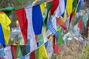 Tibetan Prints: Bhutan, Thimphu. Colorful prayer flags on mountain top at the Sangaygang Geodetic Station