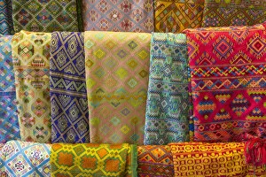 Bhutan Gallery: Bhutan, Thimphu. Colorful textiles for sale in a shop