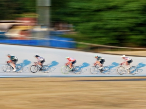 Prints of Bicyclists racing in the Jerry Baker Memorial Velodrome, Redmond, Washington State. (Editorial Use Only) Images Dated 2024 September: Bicyclists racing in the Jerry Baker Memorial Velodrome