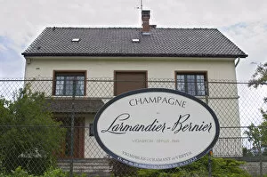 A big sign saying Champagne larmandier-Bernier, wine grower since 1849, vineyards in Cramant