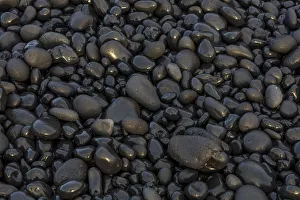 Polished Prints: Black pebbles on the beach on the Snaefellsnes Peninsula in western Iceland