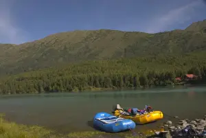 Paddle Prints: A blue and a yellow rubber raft on the Kenai River along the Sterling Highway in Alaska