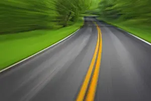 Blurred motion view of U. S. 441 through the Great Smokies National Park, from a moving automobile