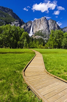 Boardwalk Prints: Boardwalk through meadow under Yosemite Falls, Yosemite National Park, California USA
