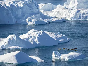 Boat at Ilulissat Icefjord, a UNESCO World Heritage Site, also called kangia or Ilulissat