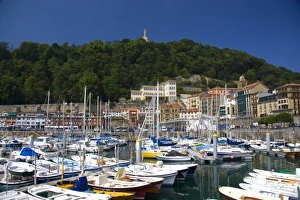 Liberian Peninsula Prints: Boats docked at the city of Donostia-San Sebastian