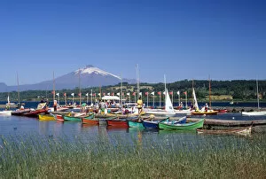 Images Dated 23rd December 2005: Boats docked at a marina with Villarica volcano in Villarica, Chile