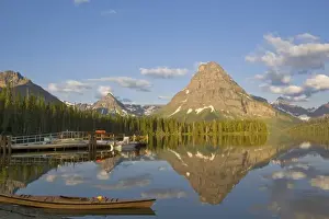 Sea Kayak Prints: Boats and kayak along Two Medicine Lake in Glacier National Park in Montana