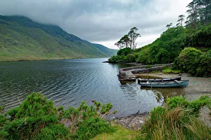 Quay Prints: Boats wait for passengers at Doo Lough, part of a national park in County Mayo, Ireland