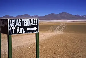 Tire Track Prints: Bolivia, Aguas Calientes, Sign pointing the way to hot springs or aguas termales