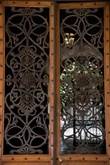 Emilia Romagna Prints: Bologna, Emilia-Romagna, Italy - A gage can be seen behind double wooden doors with
