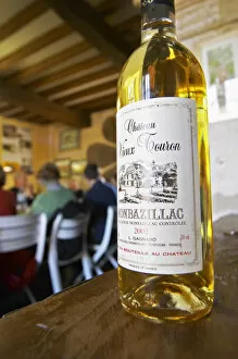 A bottle of sweet white Chateau Vieux Touron Monbazillac that goes well with truffles