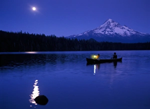 Images Dated 24th October 2005: Two boys in canoe with lantern at night on Lost Lake with Mt Hood in the background