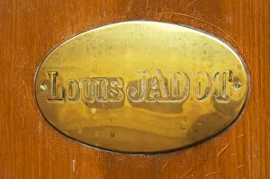 The brass plate on the entrance door of Maison Louis Jadot. Maison Louis Jadot