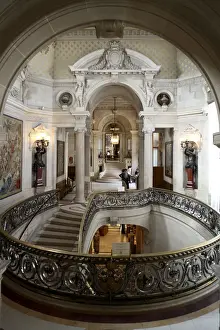 Décor Prints: The brass railing decorated staircase in Chateau de Chantilly. Chantilly. France