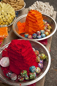Bowl Prints: Bright red and orange tikka powder, Pushkar, Rajasthan, India