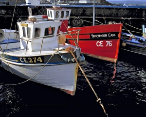 Londonderry Prints: Brightly colored boats moor in the harbor at Portstewart