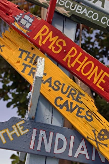 British Virgin Islands, Marina Cay. Colorful painted directional signs