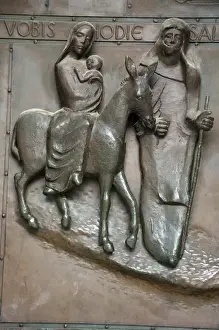 Basilica Prints: Bronze relief of Mary, Joseph and infant Jesus traveling to Egypt to escape wrath