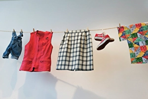 Hanging Prints: Brussels, Belgium. Second hand clothes for sale at thrift store. (Editorial Use Only)