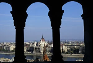 Budapest, Hungary. View through the arches from Buda; the Parliament across the Danube