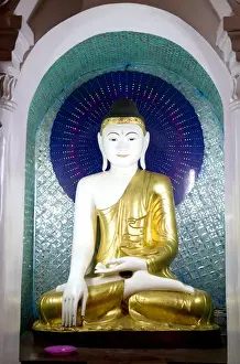 Burma Prints: Buddha statue at the Shwedagon Paya located in (Rangoon)Yangon, (Burma) Myanmar
