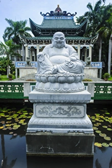 Buddhism Prints: Buddhist statue before the Taoist temple in Davao, Mindanao, Philippines