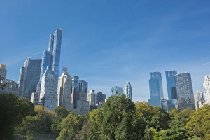 Greg Probst Prints: Buildings along Central Park South will Wollman Rink in Central Park, New York City, NY