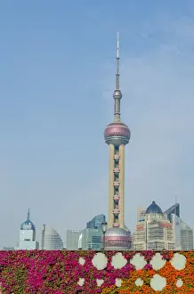 Chinese Prints: The Bund gardens with Pearl Tower over Pudong district skyline Shanghai, China