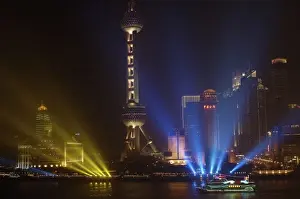 Images Dated 15th June 2006: The Bund (waterfront) in Shanghai. Looking across the river at the Oriental Pearl
