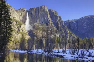 Images Dated 31st March 2011: CA, Yosemite NP, Yosemite Falls reflected in Merced River