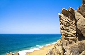 Cabo San Lucas, Baja California Sur, Mexico - A beach with a large rock formation