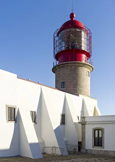 Costa Vicentina Prints: Cabo de Sao Vincente (Cape St. Vincent) with its lighthouse at the rocky coast of